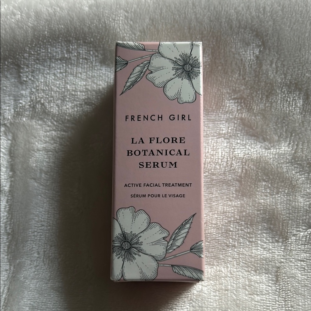 Pink Serum with Floral Design and Natural Ingredients